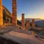 Ancient ruins of the Temple of Apollo at Delphi at golden hour