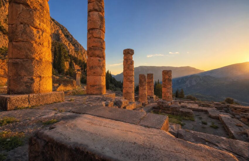 Ancient ruins of the Temple of Apollo at Delphi at golden hour
